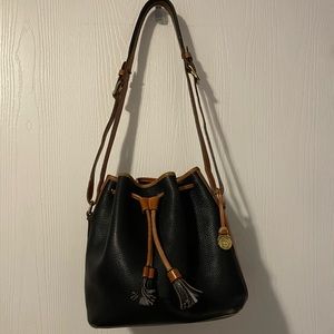 Dooney and Bourke black and brown drawstring purse with matching wallet